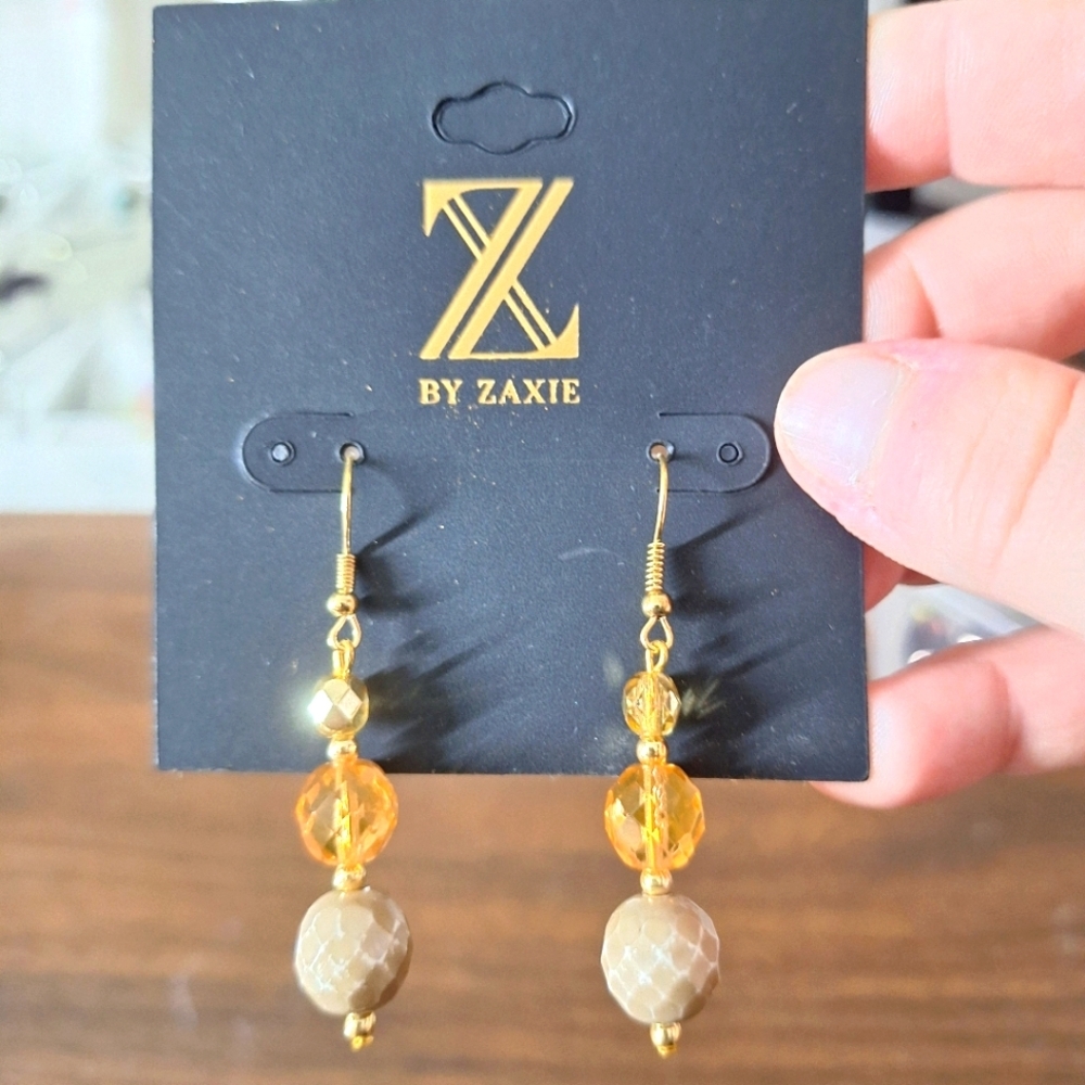 Zaxie orange dangling earrings